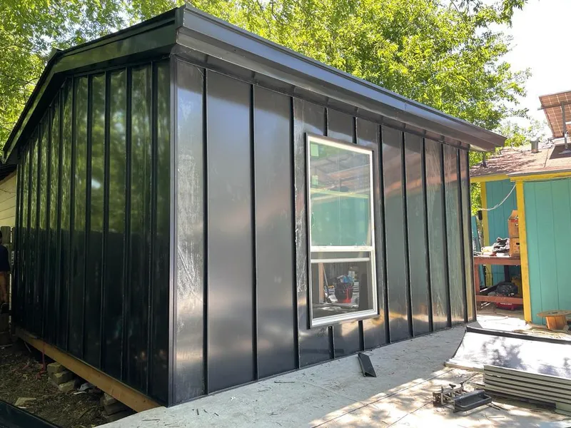 Black standing seam metal wall panels for Metal Roof Installation in Kirksville