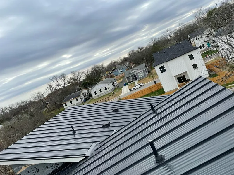 Standing seam metal roof panels with vents for Skylight Repair in Kirksville